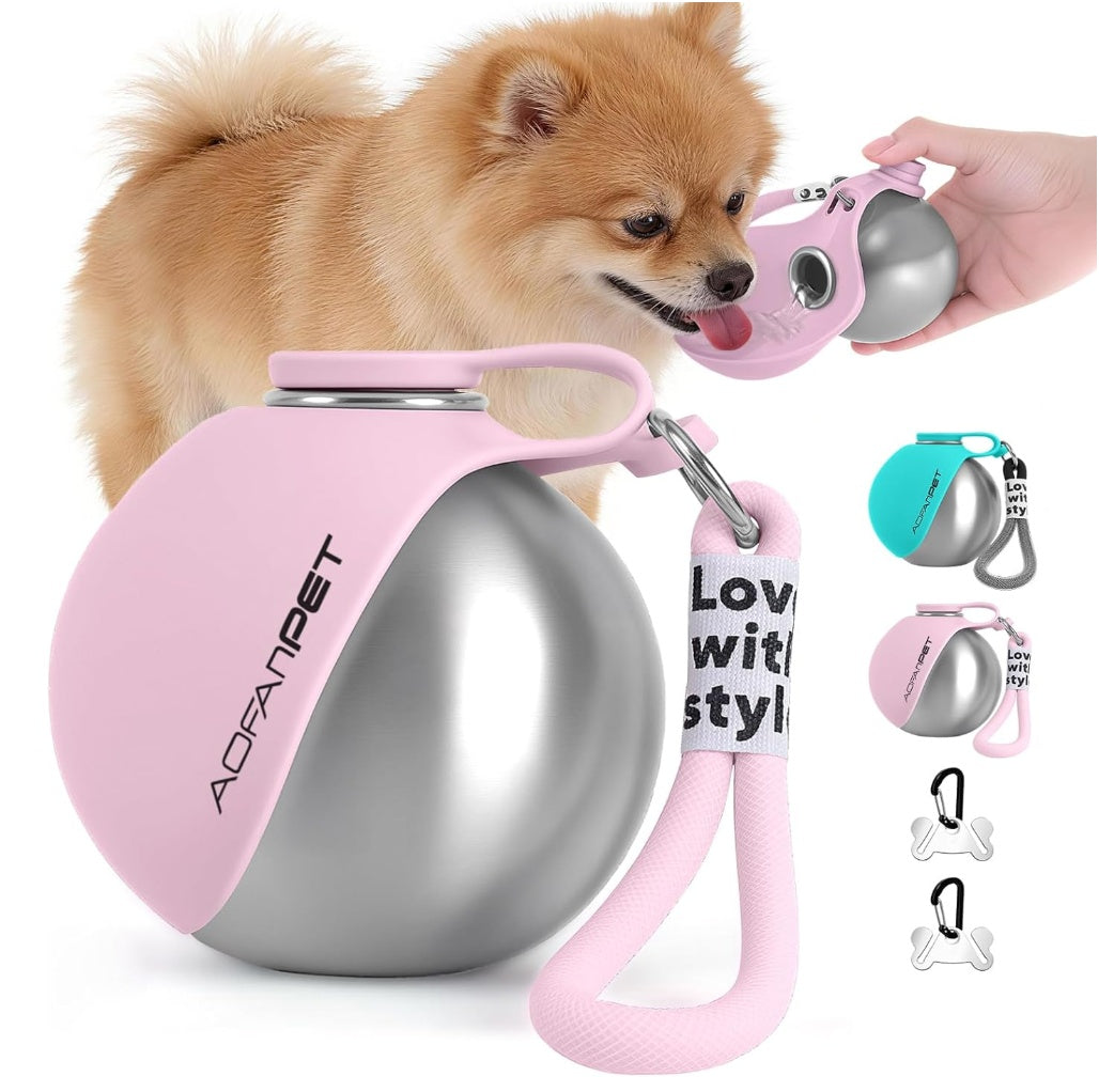 Pink and silver dog water bottle with handle, dog visible in the background