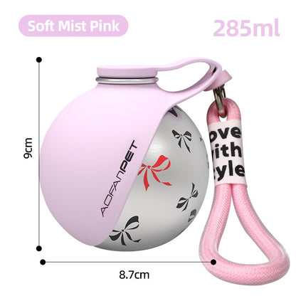 Pink and gray bottle with a keychain, labeled 'Aeranest', on a white background.