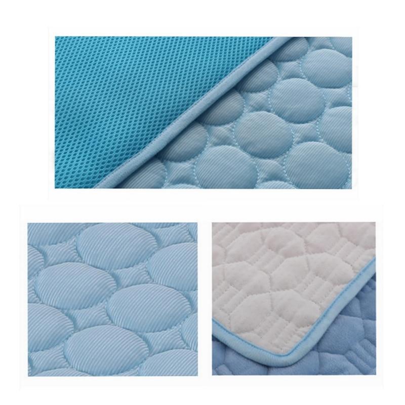 Blue quilted pad with textured surface and corner detail for dogs and cats