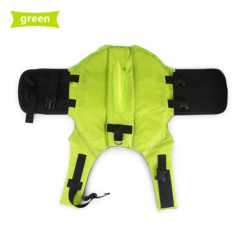 Green shark pet life jacket for dogs featuring a fun shark fin design, secure buckles, and flotation support.