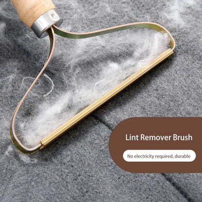 Manual lint remover brush for carpets and upholstery